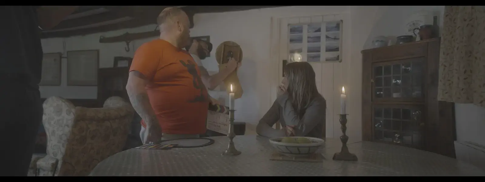 The Havenfall crew preparing a candlelit interior scene